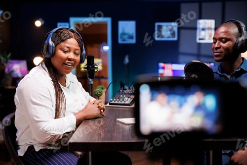 Preview: Talks show hosts using professional camera