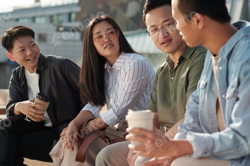 Preview: Group of colleagues discussing working points at meeting
