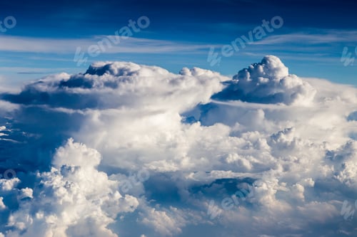 Preview: blue sky with the clouds from the plane view