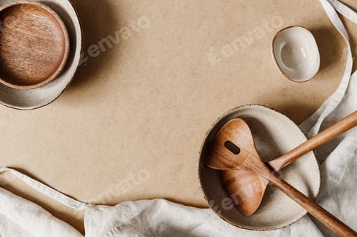 Preview: Modern minimalist ceramics set with a linen cloth over kraft paper background.