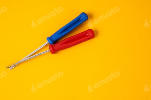 Preview: screwdrivers and construction tools on yellow background equipment for repair industry