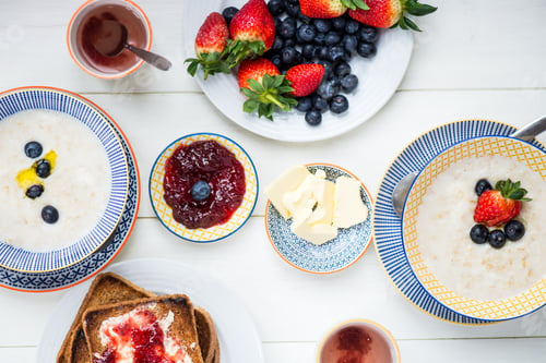 Preview: Tasty Family Breakfast with Toasts, Porridge, Berries