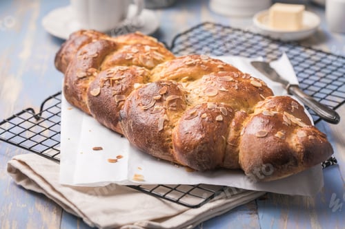 Preview: Tsoureki braid, greek easter sweet bread, on wood
