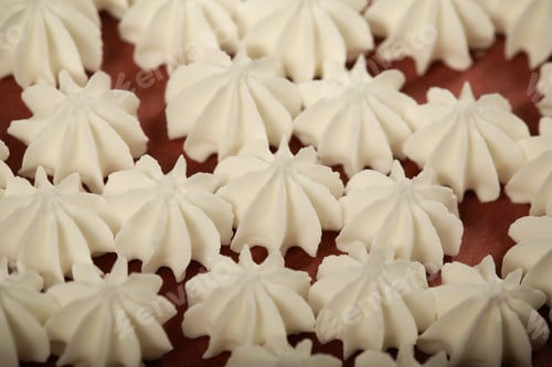 Preview: Meringue Small Lies On A Bright Background