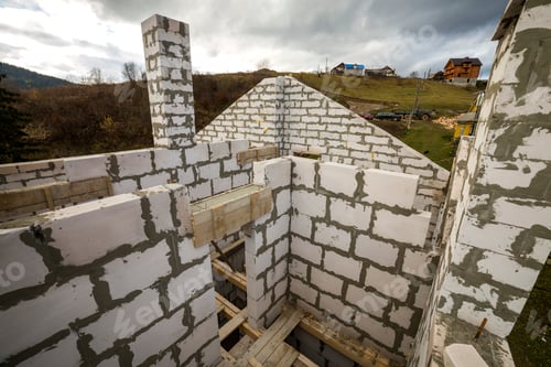 Preview: Interior of future cottage, energy saving walls and chimney of large white hollow foam