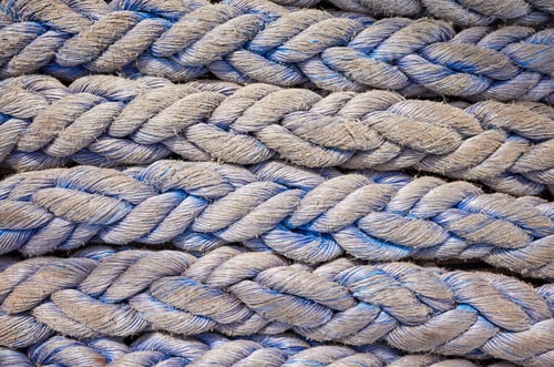 Preview: Close up picture of frayed boat ropes.
