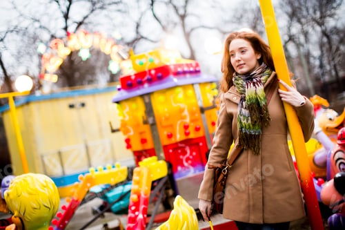 Preview: Young couple in the amusement park