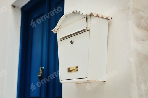 Preview: Check your mail. Cropped shot of letterbox on a residential building.