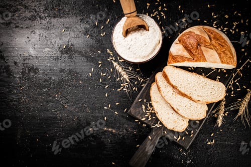 Preview: Sliced wheat bread on a cutting board.