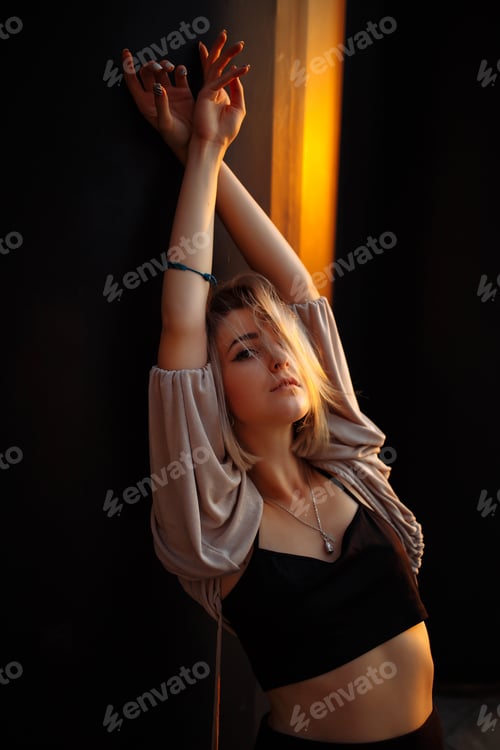 Preview: Beautiful woman standing on roof, feel happy at sunset. Freedom. Lifestyle, relaxation concept.