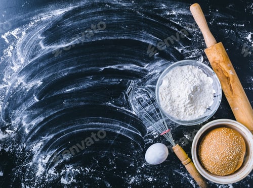 Preview: Ingredients and utensil for baking on the black board, top view
