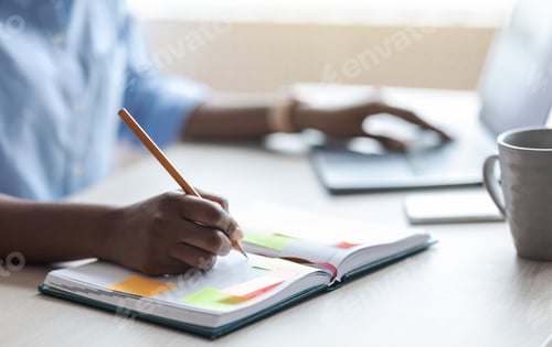Preview: Busy Unrecognizable Woman Writing In Notepad, Taking Notes At Workplace In Office
