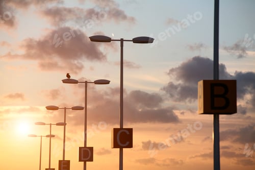 Preview: Capital letters on lamppost at sunset, Frankfurt, Hessen, Germany, Europe