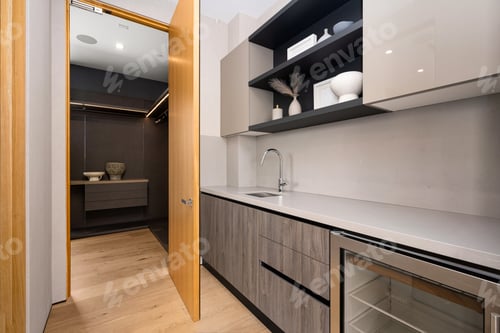 Preview: Kitchen interior with shelves and a door leading to another room