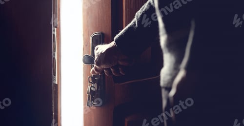 Preview: Silhouette of an elderly man opening the door