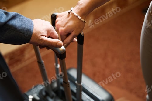 Preview: Man and woman stand side by side in lobby hotel