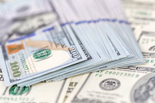 Preview: American dollars. A stack of new hundred dollar bills. Closeup view.