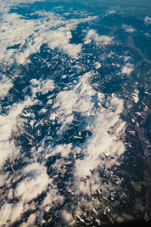 Preview: Clouds Over The Snowy Mountains From Above