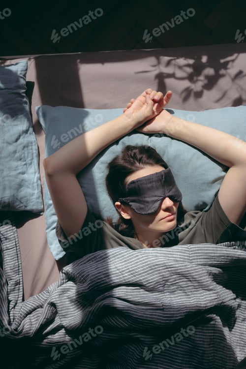 Preview: young woman with sleep deprivation and mental disorders. jet lag or insomnia due to stress at work.