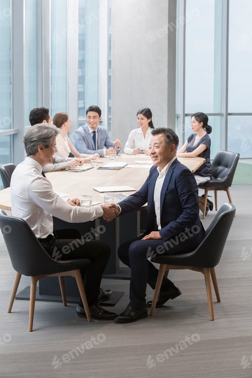 Preview: Business people having meeting in board room