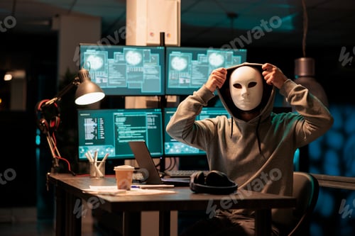 Vista previa: Scary masked hacker installing virus to hack system