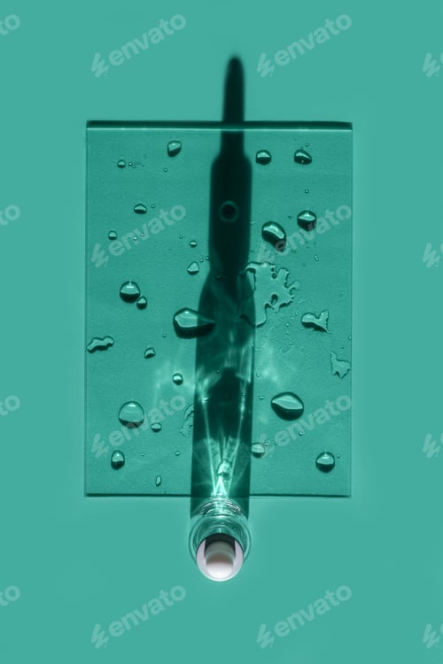 Preview: top view of glass face serum bottle