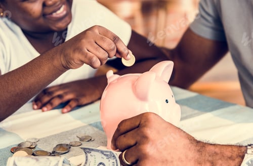 Preview: Dad and daughter saving money to piggy bank