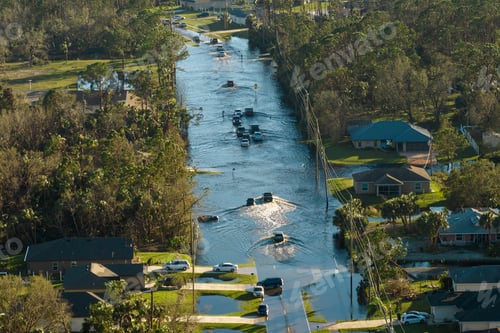 Preview: Hurricane flooded street with moving cars and surrounded with water
