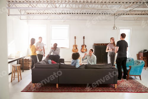 Preview: Friends at a party in a New York loft apartment, full length