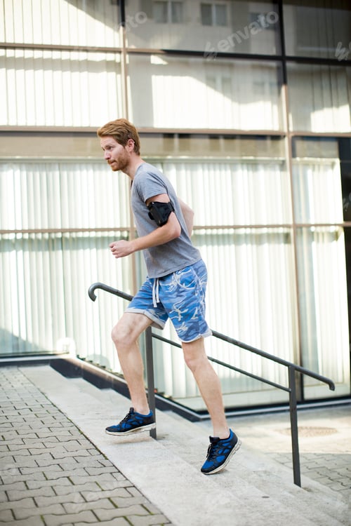 Preview: Young man running in the urban area