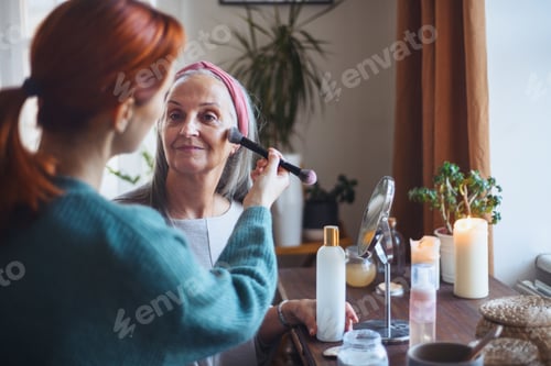 Preview: Caregiver helping her client with a make up.