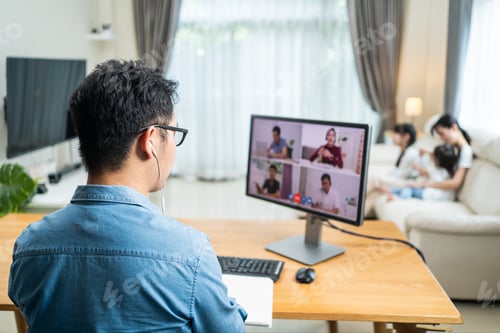 Preview: Asian Working business man father talk to colleagues team on virtual video call conference online