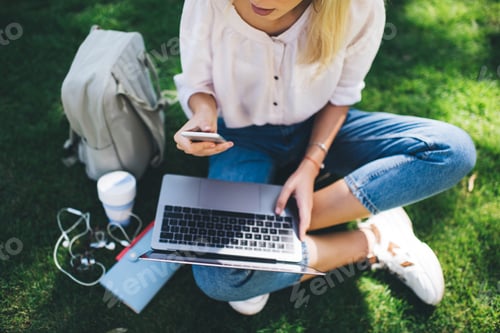 Preview: female freelancer doing distance job during online networking for creating web design