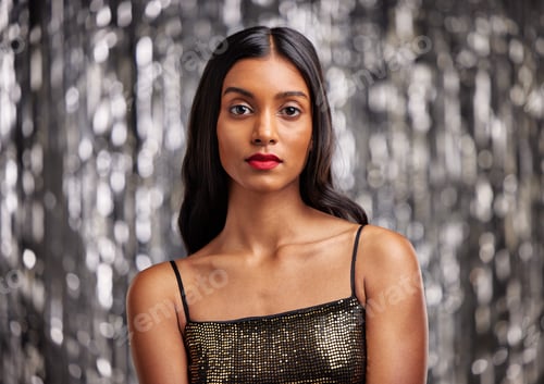 Preview: Makeup, portrait and Indian woman in studio with glamour, cosmetics and attitude on blurred backgro