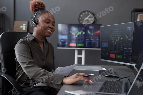 Preview: African American broker working at her workplace
