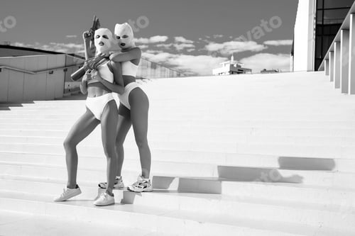 Preview: Two hot women in balaclava masks outdoors