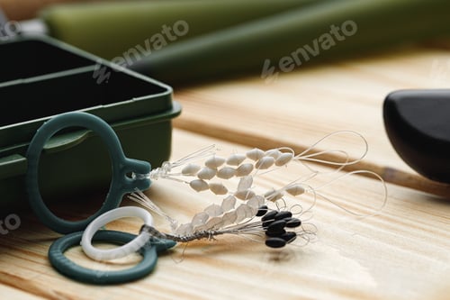 Preview: Fishing gear on wooden background close up