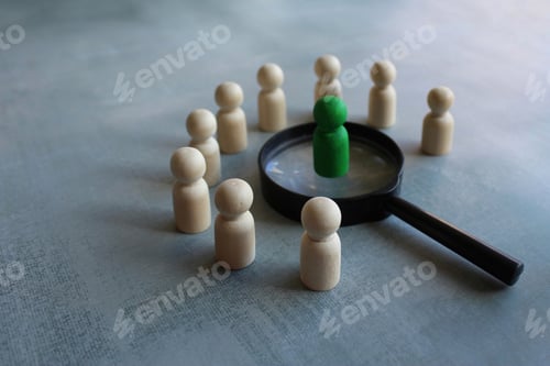 Preview: Wooden dolls and magnifying glass