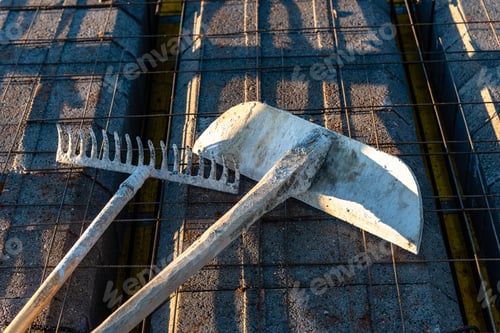 Preview: Construction equipment, shovel and rake for pouring concrete