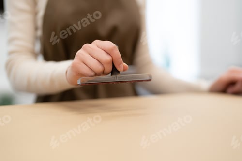 Preview: Woman working in her shop. Small business. Order delivery