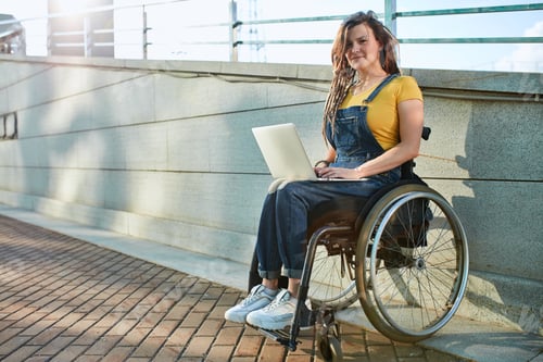 Preview: pleasant young woman conducting online consultations