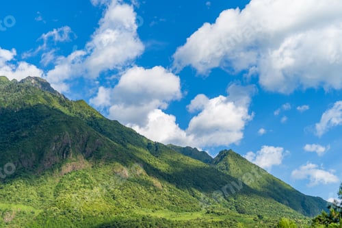 Preview: Fansipan mountain hills valley with forest trees. Panoramic view at Sapa, Vietnam.
