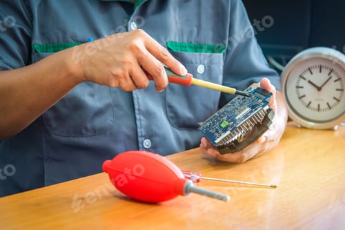 Preview: mechanic repairing hard drive, hard drive It is a device for storing data