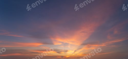 Preview: Sunset sky. Abstract nature background. Dramatic blue and orange, colorful clouds at twilight time.