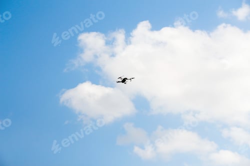 Preview: Defocus war drone. Drone flying in a blue sky. The black army un