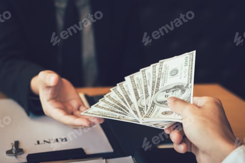 Preview: Salesman home brokers receive cash with buyers giving money for salesman.