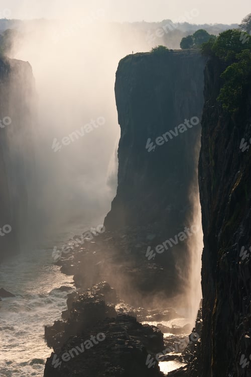 Preview: Victoria Falls, huge waterfalls of the Zambezi river flowing over sheer cliffs.