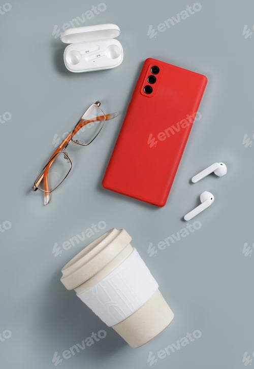 Preview: Smartphone, reusable coffee to go cup, wireless earphones and glasses