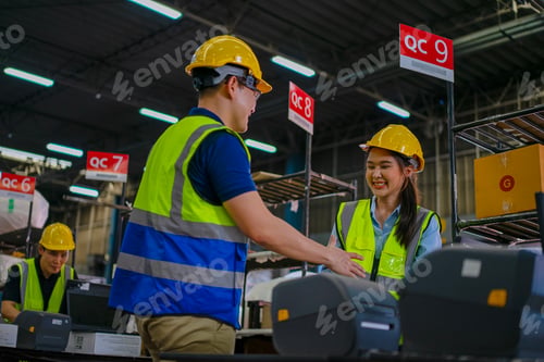 Preview: Blue collar workers are working at warehouse.