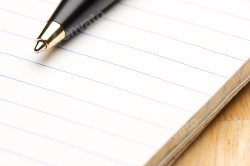 Preview: Pen and Pad of Lined Paper on a Wood Background